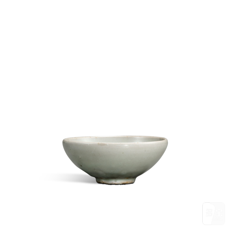 A Yaozhou celadon-glazed 'lion' bowl, Five dynasties | 五代 耀州窰青釉貼獅紋盌